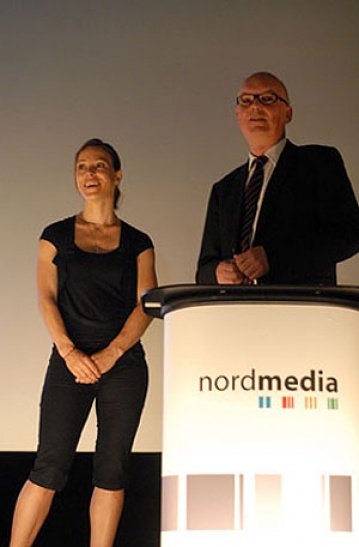 Schauspielerin Anneke Kim Sarnau und nordmedia-Geschäftsführer Thomas Schäffer